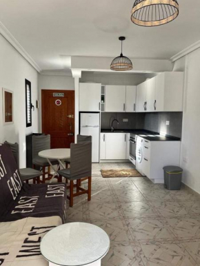 Apartment with Outdoor Pool and Air Conditioning in Cabo Roig